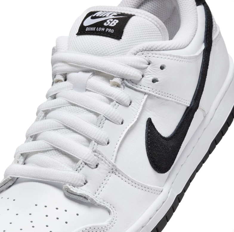Nike SB Dunk Low Pro White Sneakers with Black Swooshes