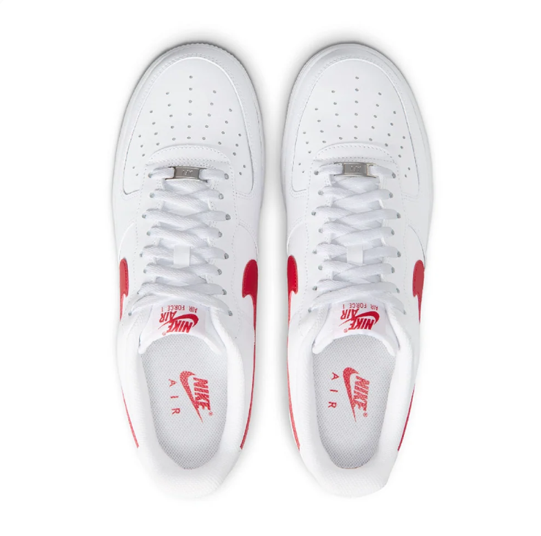 Nike White Low-Top Sneakers with Red Swoosh Details