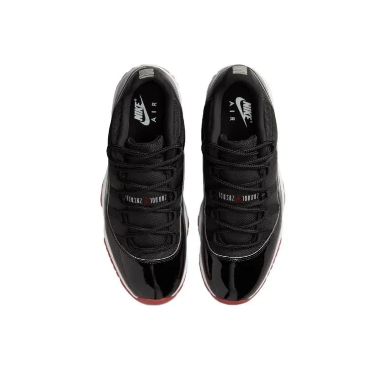 Air Jordan Black Low-Top Sneakers with Glossy Panels & Red Soles